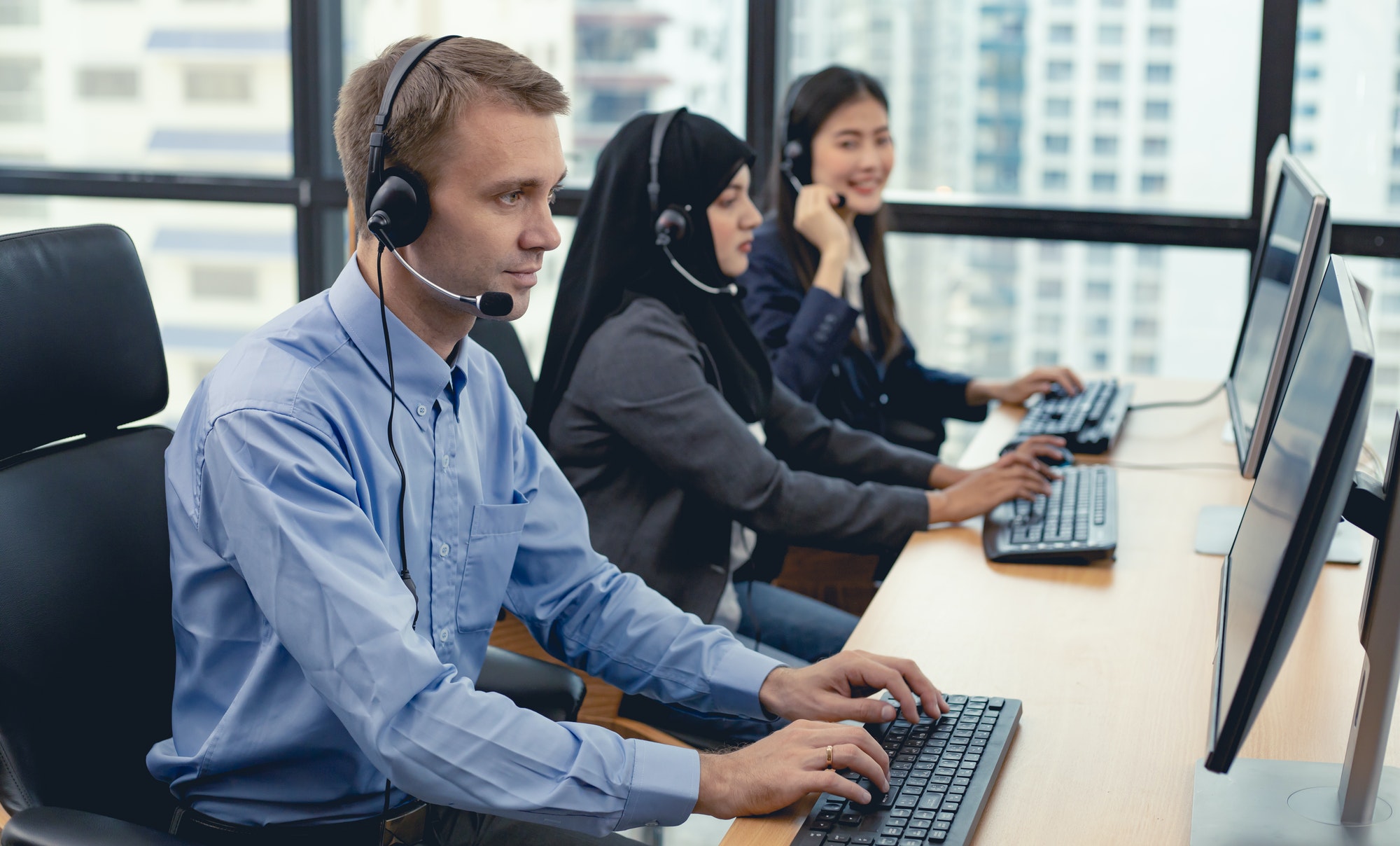 group-of-diverse-telemarketing-customer-service-staff-team-in-call-center-.jpg